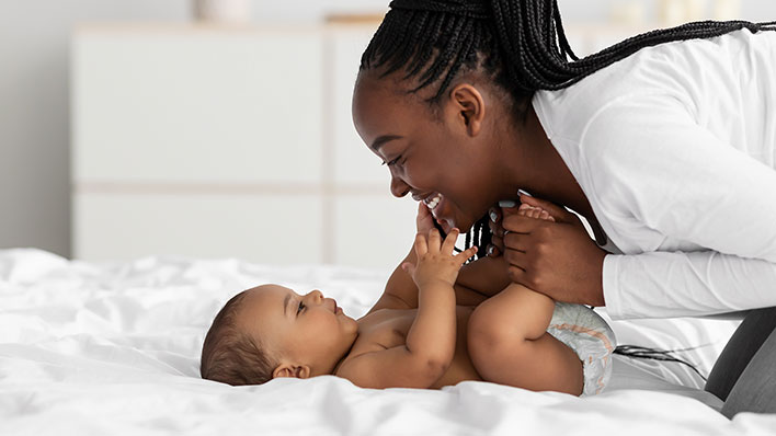 Mother Playing with Baby